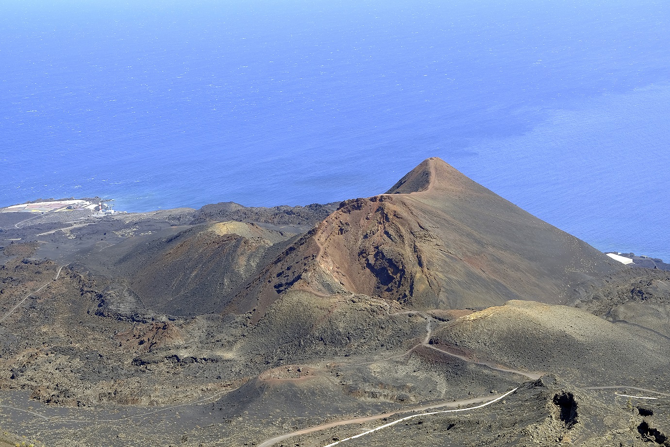 MADRID, SPAIN – SEPTEMBER 14: General view of one of the Cumbre Vieja volcanoes, an area in the south of the island that could be affected by a possible volcanic eruption, on 14 September, 2021 in Cumbre Vieja, La Palma, Canary Islands, Spain. The Government of the Canary Islands has activated the Special Plan for Civil Protection and Emergency Care due to Volcanic Risk (PEVOLCA) in the area of Cumbre Vieja (La Palma) as well as changing the traffic light from green to yellow due to the increase in seismic activity recorded in recent days. In yellow the information to the population, surveillance measures and monitoring of volcanic and seismic activity are intensified. This decision has been taken after the detection of a new seismic swarm, the eighth since last year, and hundreds of earthquakes since September 11. According to the Committee, it is not ruled out that the seismic activity felt in the coming days will intensify

. (Photo By Europa Press via Getty Images)